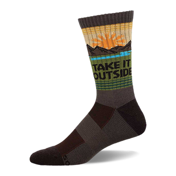Crew sock in earthy brown, green, and yellow with a sun, mountains, blue water, and "TAKE IT OUTSIDE" text.