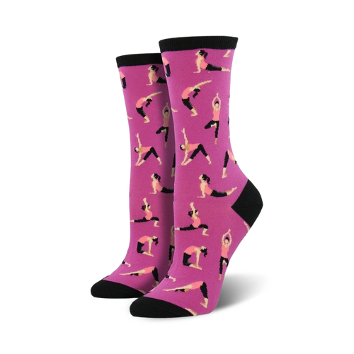 Pair of women's crew socks; pink with black accents, showcasing repeating yoga poses.