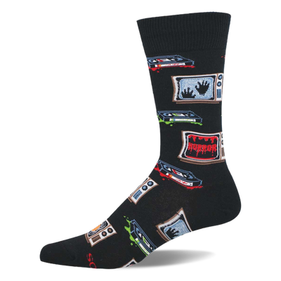 Single black crew sock featuring a pattern of vintage TVs showing ghostly hands and 'HORROR' text, with scattered VHS tapes and drips.