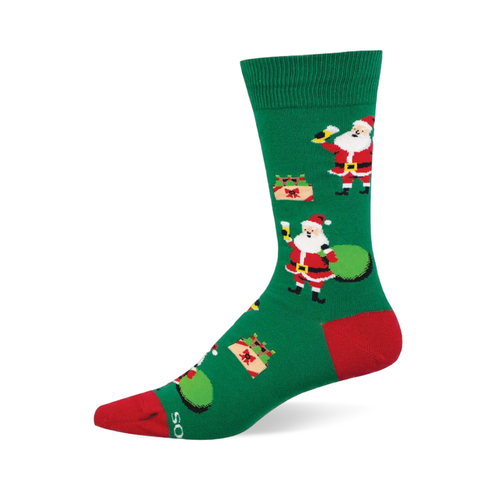 Green Christmas crew sock with thirsty Santa holding beer, gift bag, and presents. Red toe & heel accents. }}