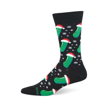 Festive black Christmas pickle sock with a pattern of green pickles wearing Santa hats and falling white snowflakes.