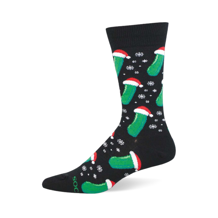 Festive black Christmas pickle sock with a pattern of green pickles wearing Santa hats and falling white snowflakes. }}