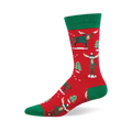 Red crew socks with green accents, featuring festive moose in teal sweaters and beanies, plus green Christmas trees and white snow.