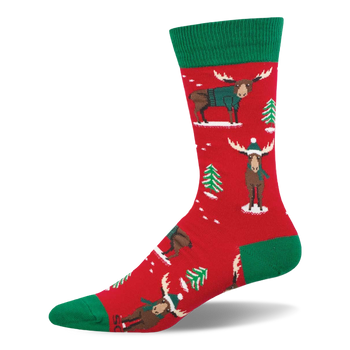 Red crew socks with green accents, featuring festive moose in teal sweaters and beanies, plus green Christmas trees and white snow.