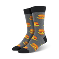 Pair of gray crew socks with repeating images of juicy cheeseburgers.  Black cuff and toes. Fun, food-themed design.