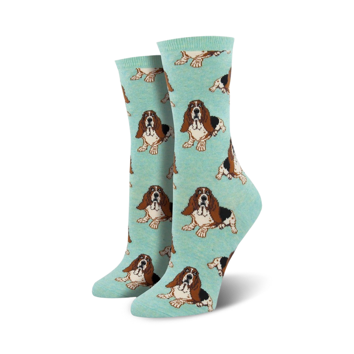 brown and black basset hound cartoon dog pattern adorns these light blue crew socks made for women.   