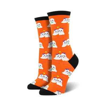 women's love you boo orange halloween crew socks with a pattern of cute ghosts, purple eyes and mouths, black toes and heels.  