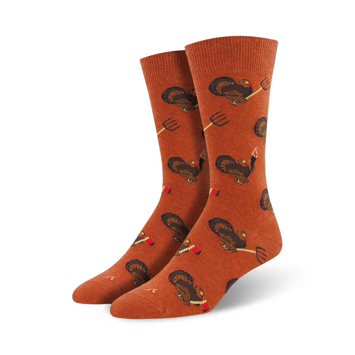 Pair of orange crew socks featuring a repeating pattern of turkeys and pitchforks.