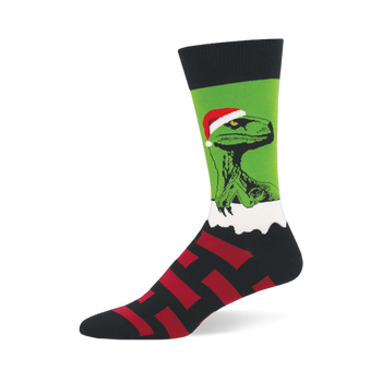 Raptor Claus sock featuring a green raptor in a Santa hat peeking over white fluff, with a black and red striped foot.