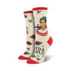 Cream crew socks with a Frida Kahlo portrait, red roses, hummingbirds, and 'Viva La Vida' text. Red and green accents.