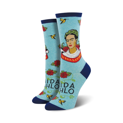 A pair of light blue 'Viva La Frida' socks on a white background. Same design as the cream socks, but in a different color scheme.