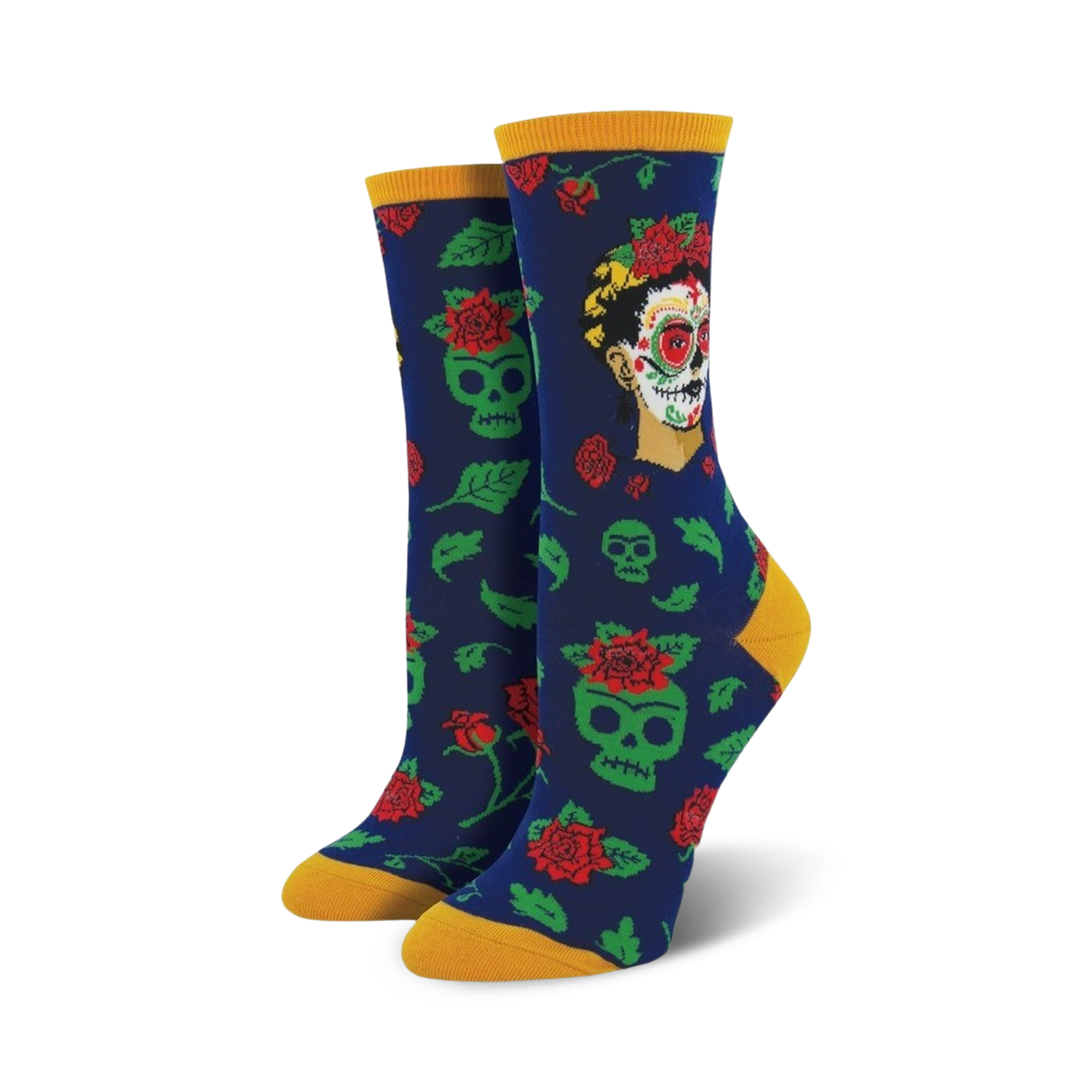 A pair of women's crew socks in navy blue. The socks feature a pattern of green sugar skulls, red roses, and a portrait of Frida Kahlo styled as a Catrina.