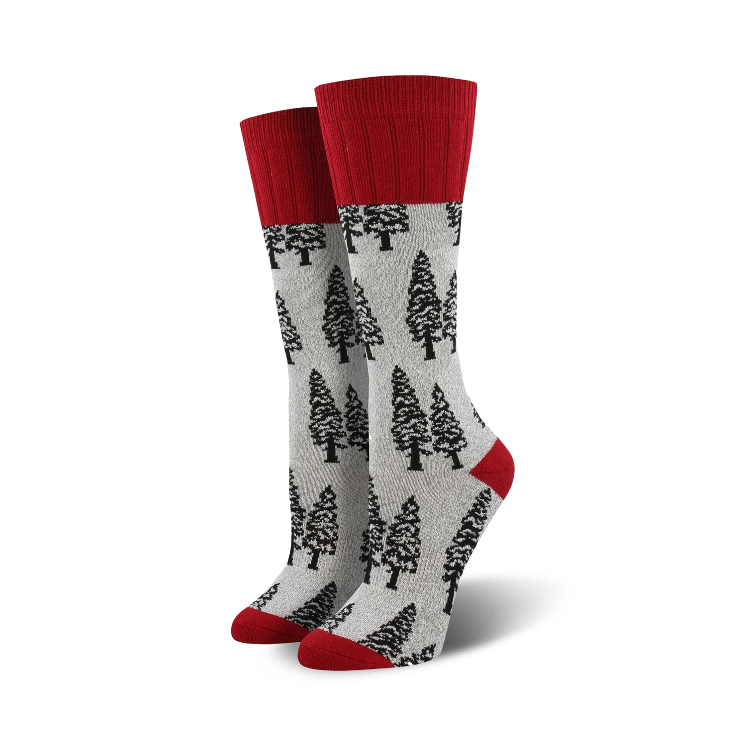 Pair of grey crew socks with a red cuff, featuring a repeating pattern of black evergreen trees.