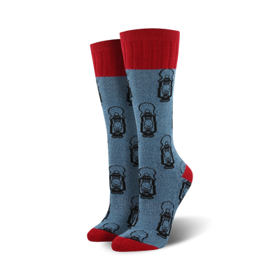  women's outdoor inspired boot sock in blue w/ red cuff & pattern of black lanterns.  