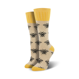 white boot socks with a black bee pattern, yellow top, and a women's size: 5-10.  