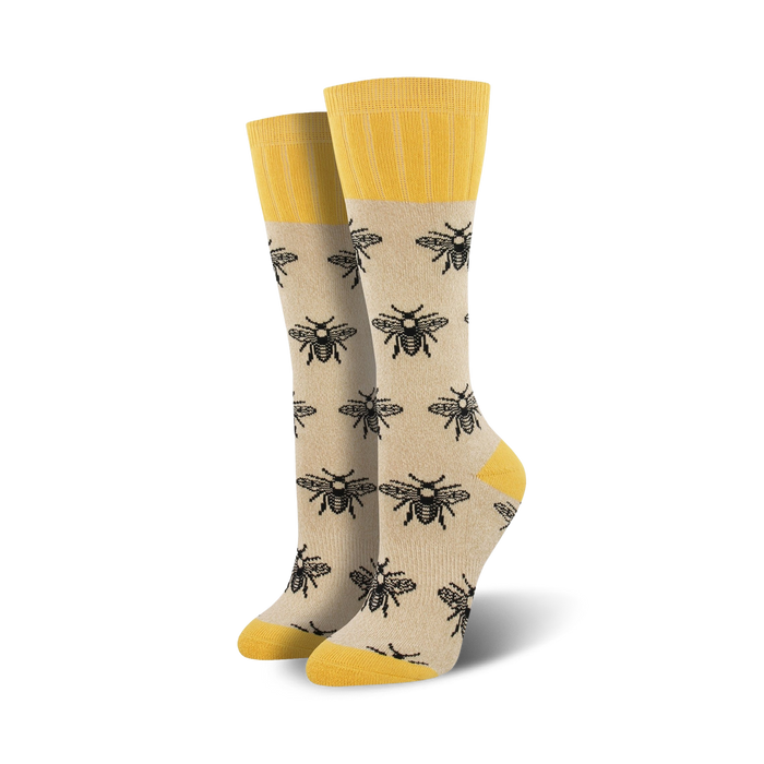 white boot socks with a black bee pattern, yellow top, and a women's size: 5-10.   }}