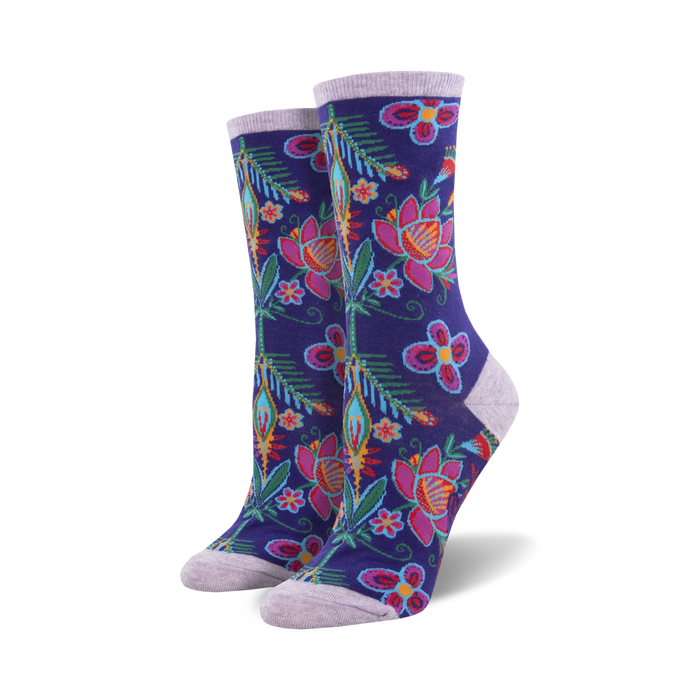 purple crew socks with floral pattern in pink, orange, yellow, blue, green, and brown. perfect for fall.  