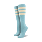 Pair of light blue knee-high socks with a vibrant rainbow striped cuff against a white background.