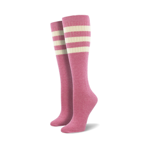 Pair of light blue knee-high socks with a vibrant rainbow striped cuff against a white background.