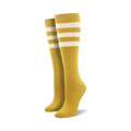 Pair of light blue knee-high socks with a vibrant rainbow striped cuff against a white background.