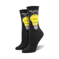 Pair of dark gray crew socks with a yellow lightbulb graphic and a Maya Angelou quote: "Nothing can dim the light which shines from within."