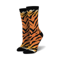 Pair of women's crew socks in orange and black with a tiger stripe pattern.