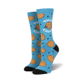 Pair of crew socks; light blue with chocolate chip cookies and grumpy cookie faces; black heel and toe.