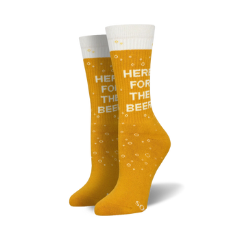 yellow crew length athletic socks for men and women with white bubbles and text that reads '{here for the beer}'.  