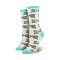 Cream crew socks with a repeating pattern of sunglasses reflecting a beach sunset. Teal accents at the top and bottom.