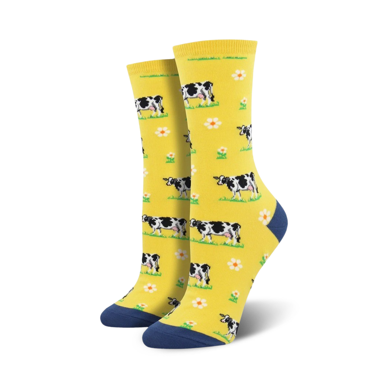 Lifestyle shot showing the yellow cow socks on a person's feet
