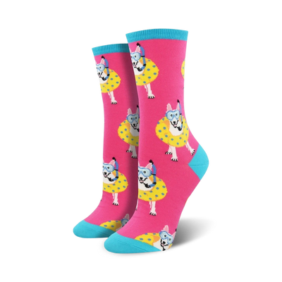 pink crew socks with a pattern of cartoon dogs wearing snorkels and inner tubes.   