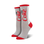 Pair of gray crew socks with a red and white Diet Coke logo design. Red accents at the toe and heel.