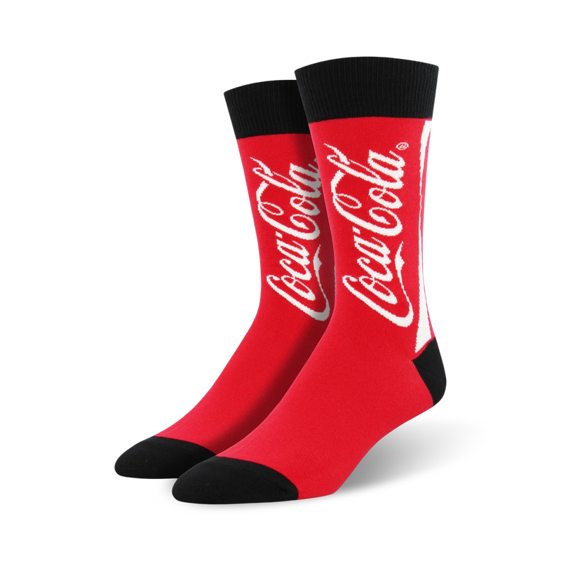 coca-cola socks in crew length, made for men with red color and a black toe/heel. the word coca-cola is splashed across the front in white.  