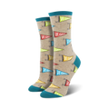 Pair of beige crew socks with colorful 'Vegan' pennants and teal cuffs.