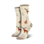 Close-up view of Winter Forest socks in cream color, showing the design detail.