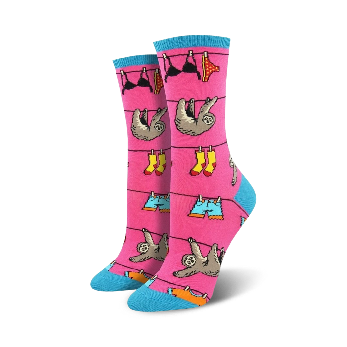 A pair of pink crew socks with sloths hanging on a clothesline with various clothing items like underwear, shorts, and boots.  Fun and colorful design.