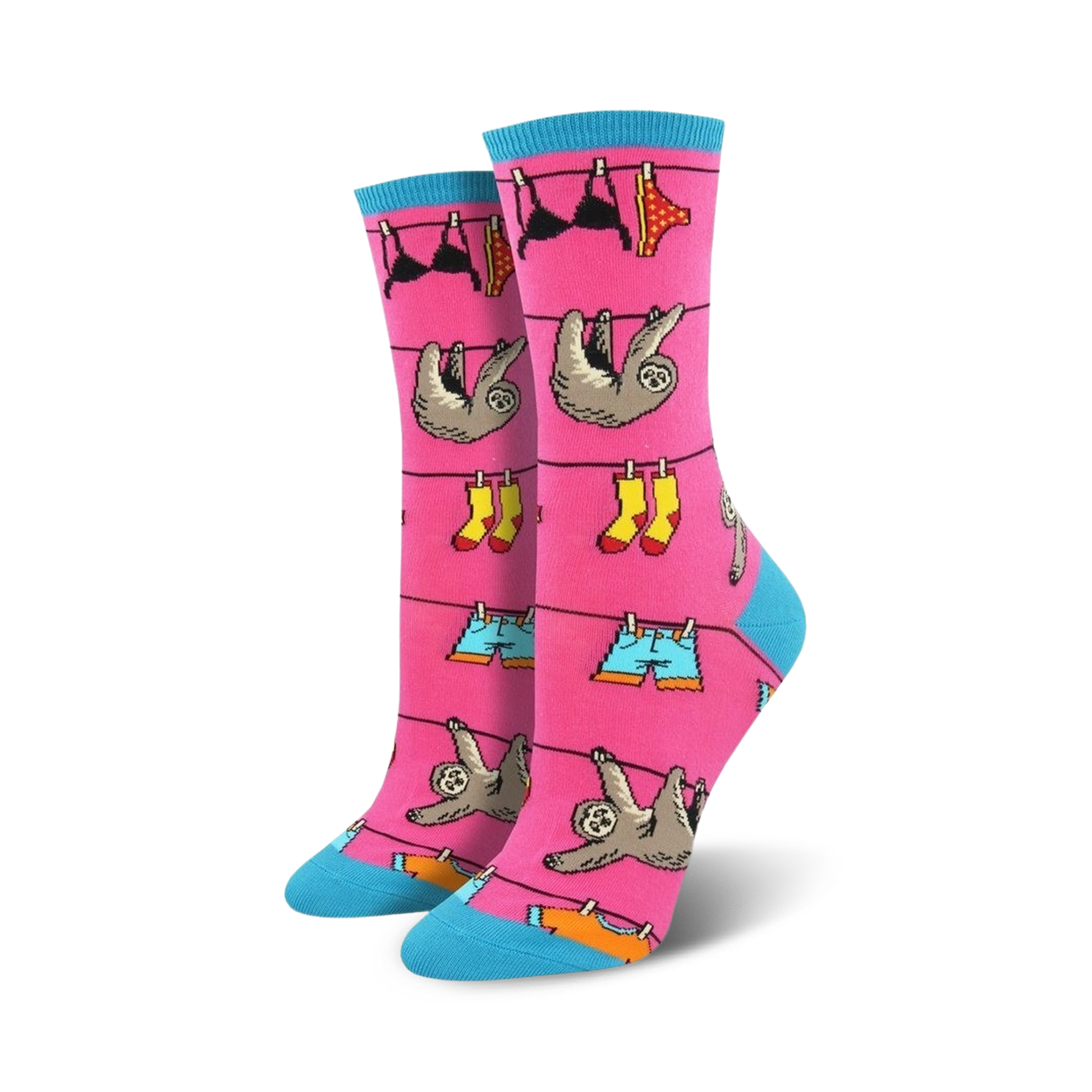 A pair of pink crew socks with sloths hanging on a clothesline with various clothing items like underwear, shorts, and boots.  Fun and colorful design.