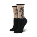 Pair of women's crew socks. Tan top with black-ink Lady Justice graphic and quote. Black bottom. 