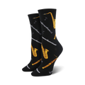 Pair of black crew socks adorned with gold saxophones, grey oboes and clarinets, and musical notes.