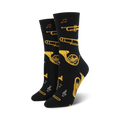Pair of black crew socks with gold brass instruments and musical notes.  Fun and stylish!