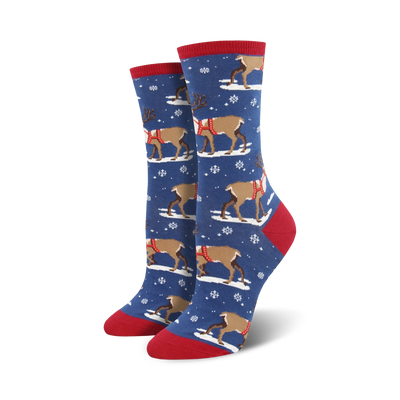 blue reindeer socks with snowflakes on a red background, perfect for the holidays. crew length.  