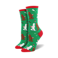 Close-up of a green Mythical Kissmas sock with red cuff, showing the Bigfoot and Yeti design detail.