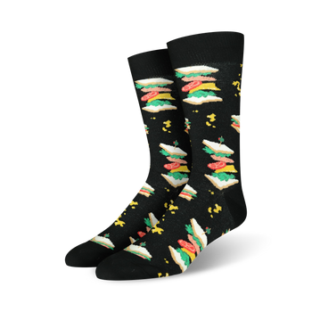 mens crew socks with a black background and a cartoon sandwich pattern including ham, tomato, lettuce, cheese, and bread.  