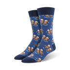 Lifestyle photo showing the blue otter socks on a person's feet; blue socks with brown otters.