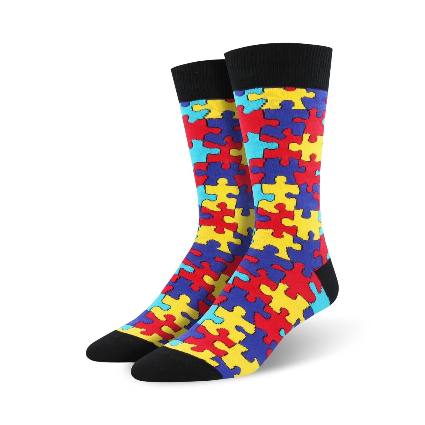 Pair of crew socks with a puzzle-piece design. The socks are predominantly red, yellow, blue, and teal.