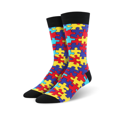 puzzled crew socks: brightly colored puzzle pieces on a black background for the ultimate brainteaser!  