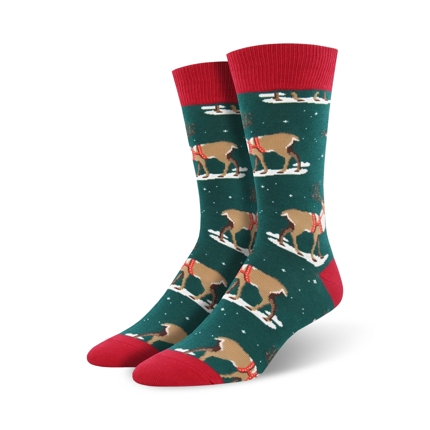 Pair of crew socks, green with brown reindeer wearing red harnesses, red cuffs, snowflakes on a dark teal background.