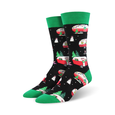 black crew socks with a pattern of christmas campers, christmas trees, snowmen, and green cuff, for men.   