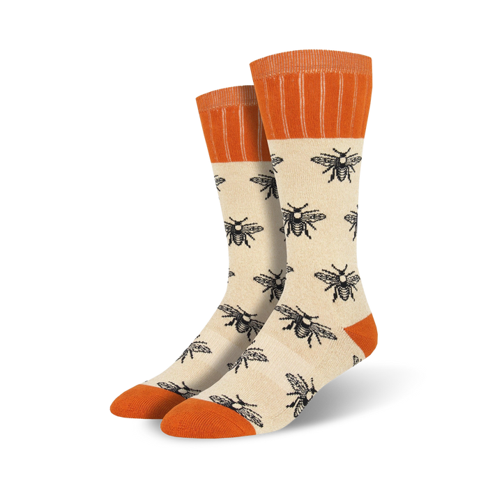 **cream-colored boot socks with black bees and orange wings. keywords: bees, honey, nature, funky socks, mens, cream.**    }}