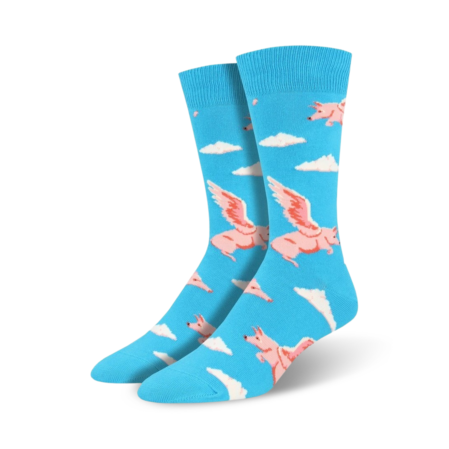 Pair of blue crew socks featuring a fun pattern of pink winged pigs flying above white clouds.